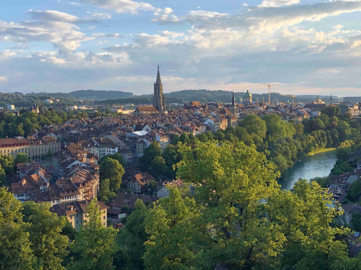 Panoramic view of Bern with river Aare at sunset.