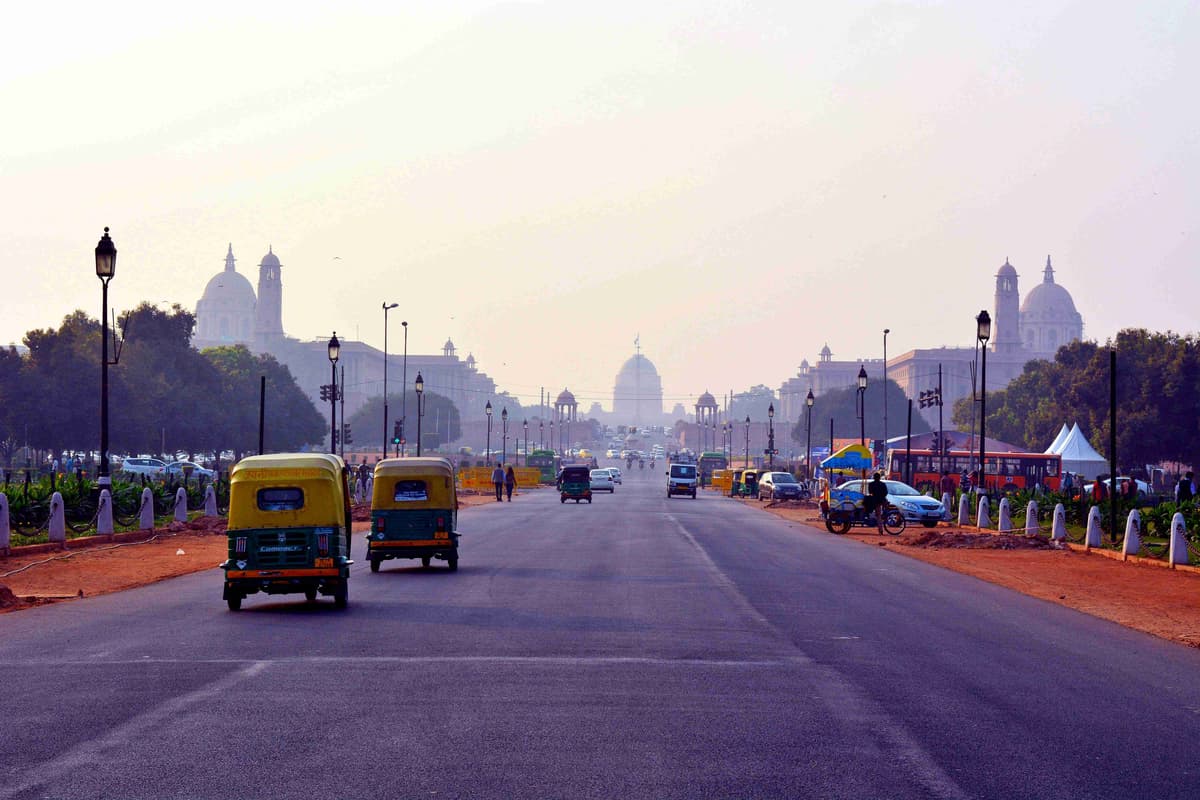 Bustling Avenue with Iconic Buildings  in the Background