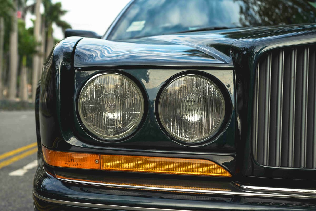 Classic Black Car Front Headlights Closeup