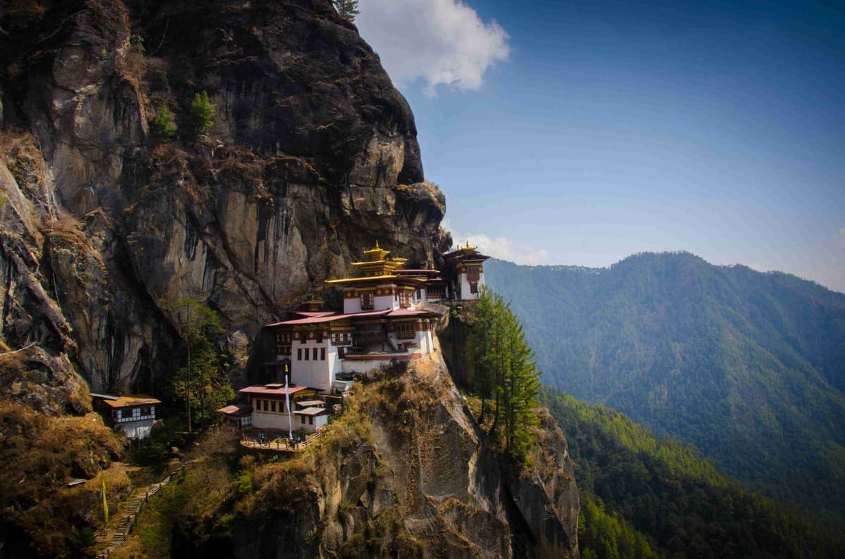 Cliffside Monastery Amidst Mountainous Terrain