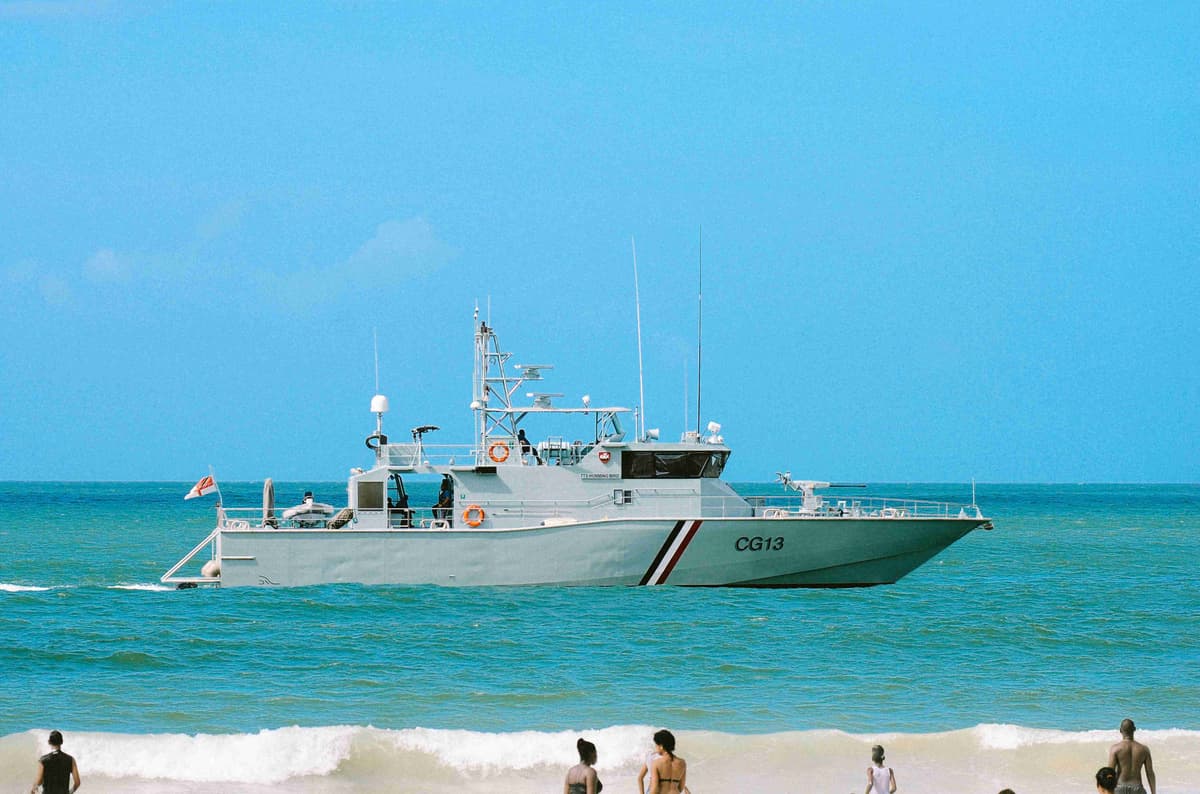 Coastal Patrol Boat Near Shoreline