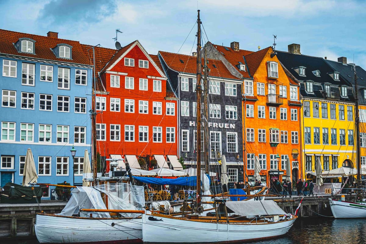 Colorful Houses and Sailboats at Copenhagen Harbor
