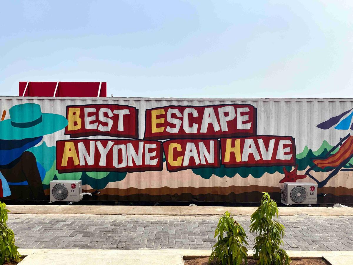 Colorful Mural Beach Escape Slogan