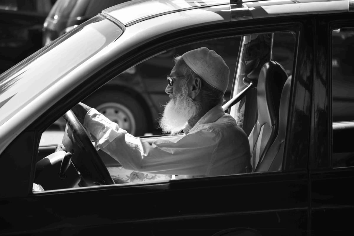 Elderly Man Driving Car Black And White