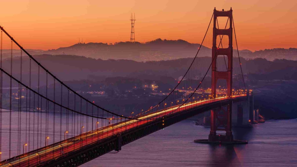 Golden Gate Bridge at Sunrise with City Backdrop