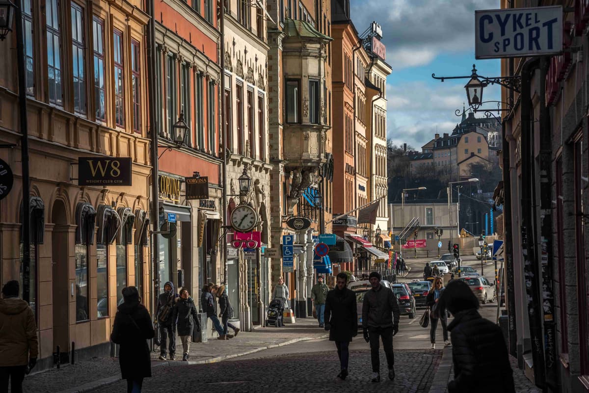 Historic Street with Pedestrians in European _City