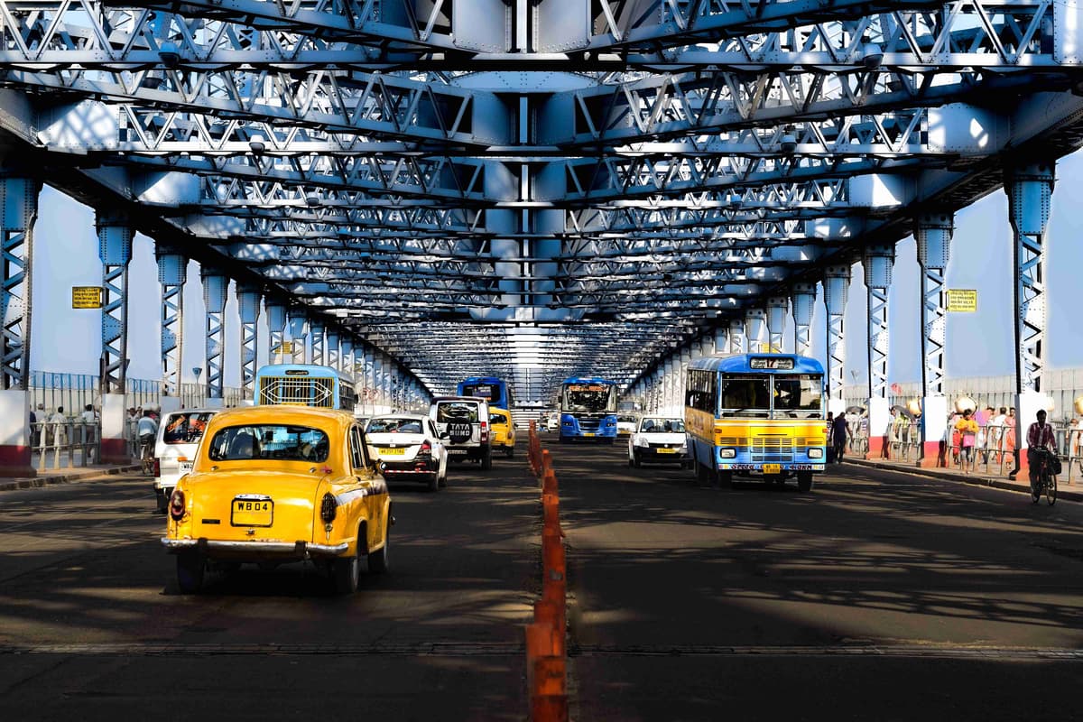 Iconic Yellow Taxi on Blue Steel Bridge