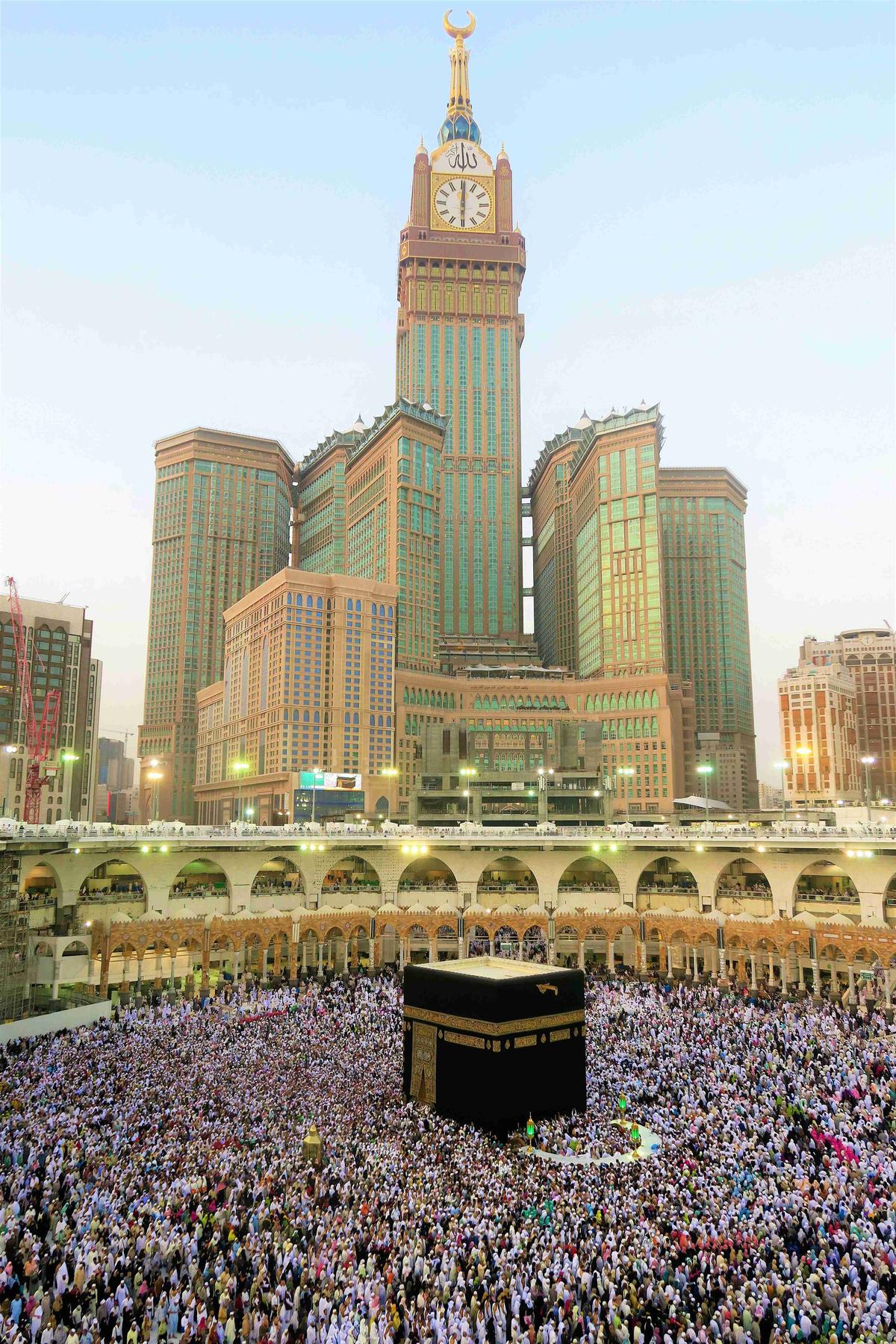 Kaaba with Clock Tower and Gathered Crowd