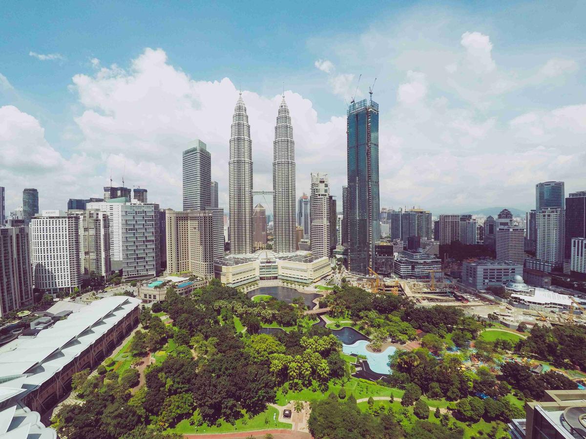 Kuala Lumpur Skyline with Petronas Towers and Urban Park