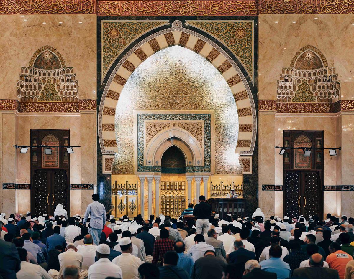 Prayer Time at Ornate Mosque Interior