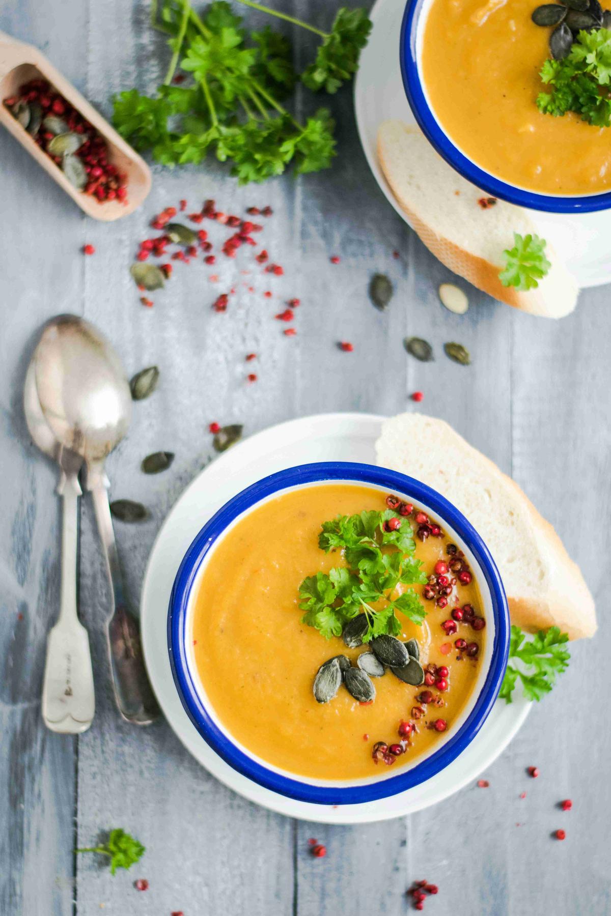 Pumpkin Soup Topped with Seeds and Herbs