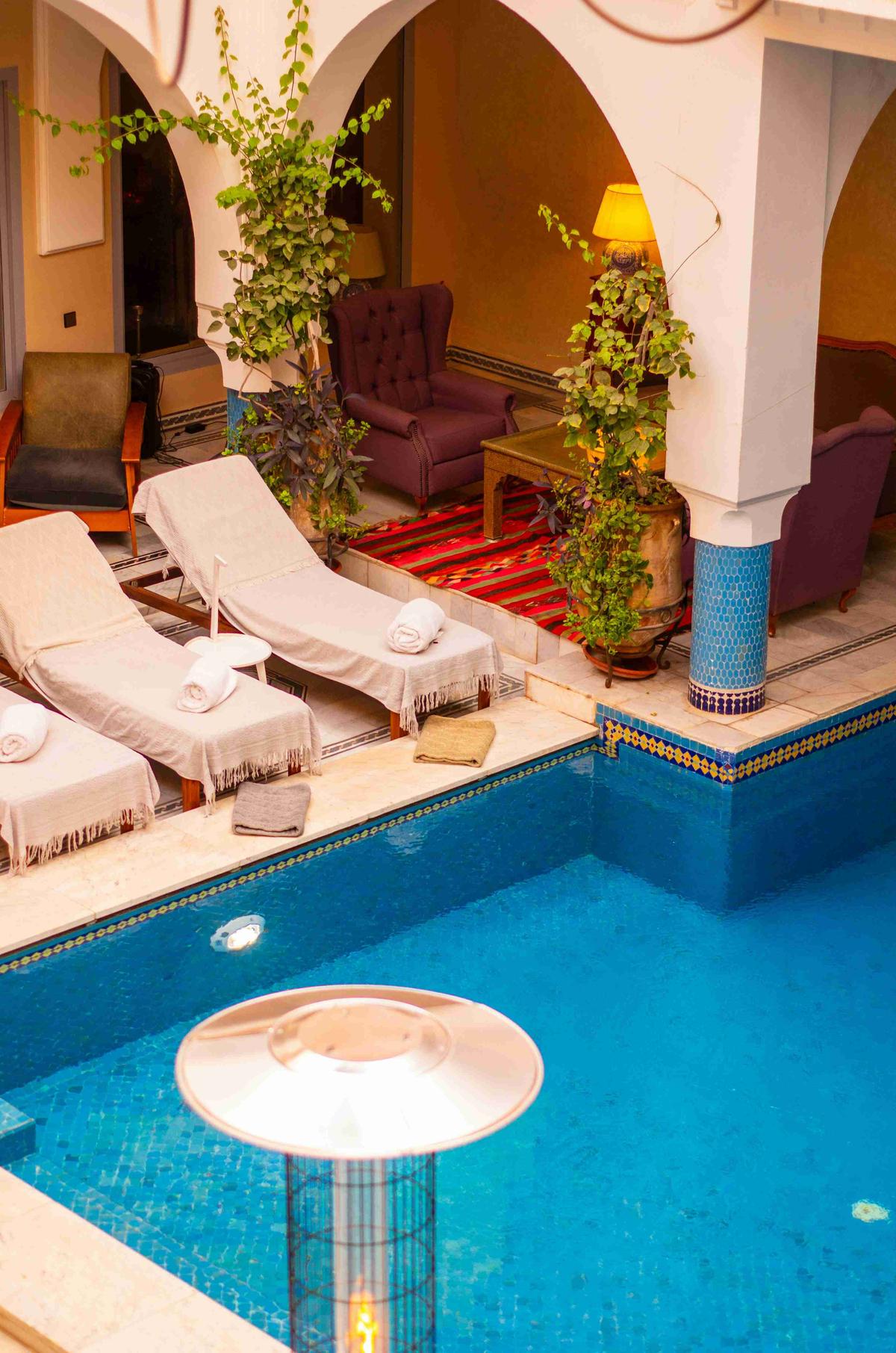 Riad Interior with Indoor Pool and Relaxing Lounge Area