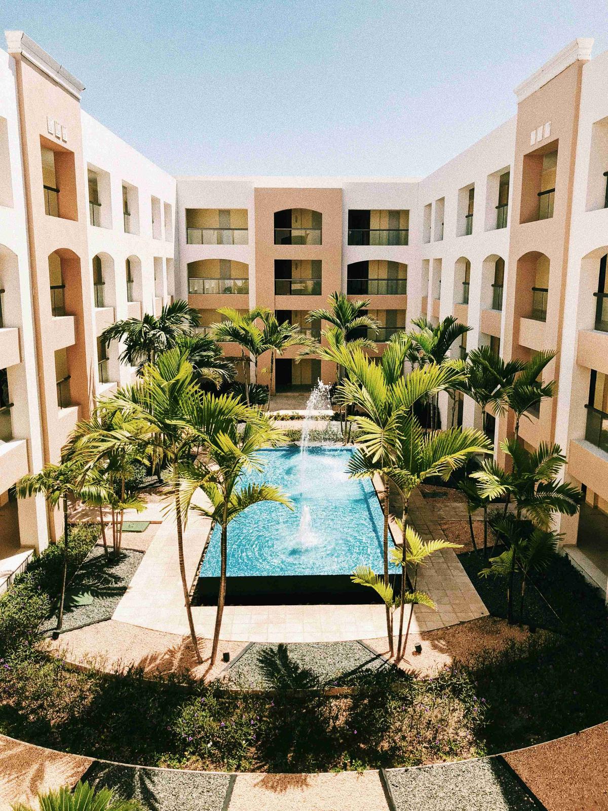 Tropical Courtyard Pool Oasis