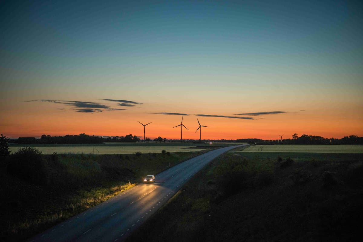 Twilight Road with Wind Turbines