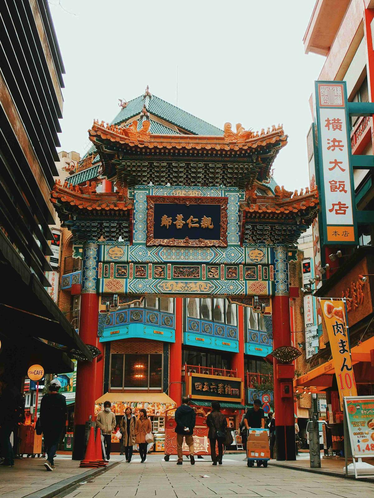 Vibrant Entrance to Chinatown with Pedestrians