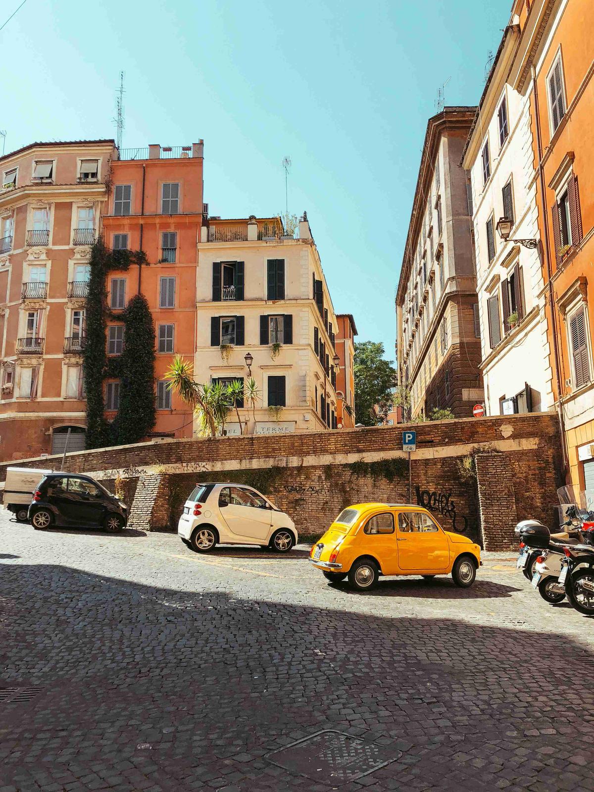 Vintage_Yellow_Car_Cobblestone_Street_Rome
