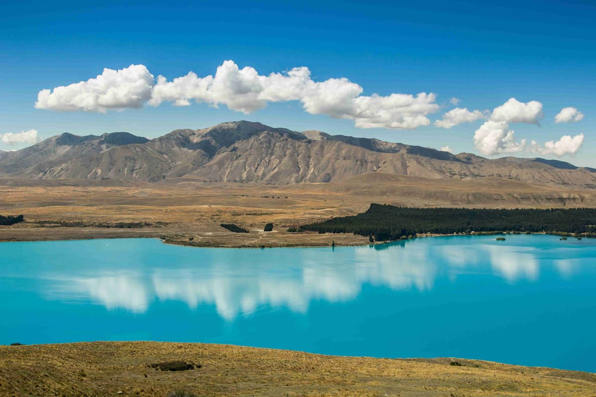 Vivid Turquoise Lake with Mountain Backdrop
