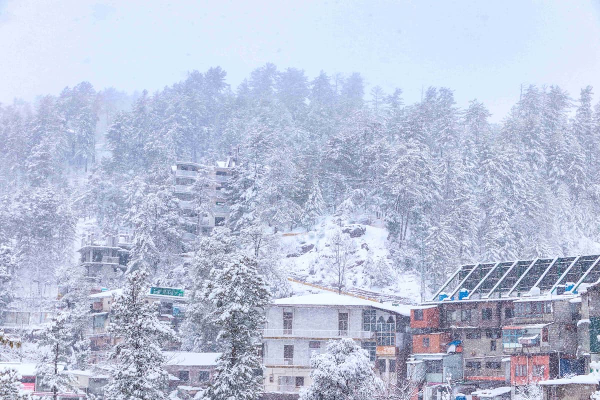 Winter Snowfall in Mountain Town