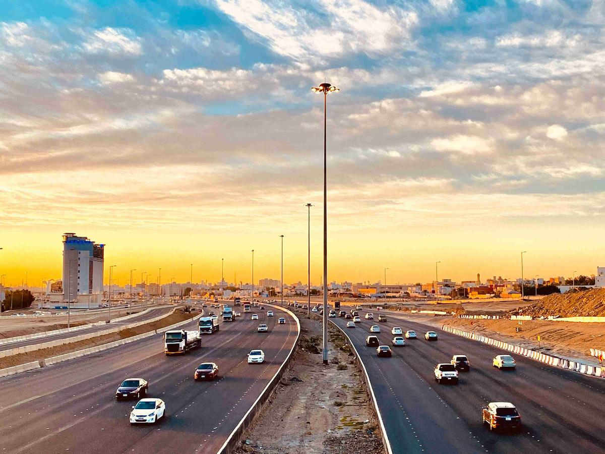Cars on a Busy Highway at Sunset