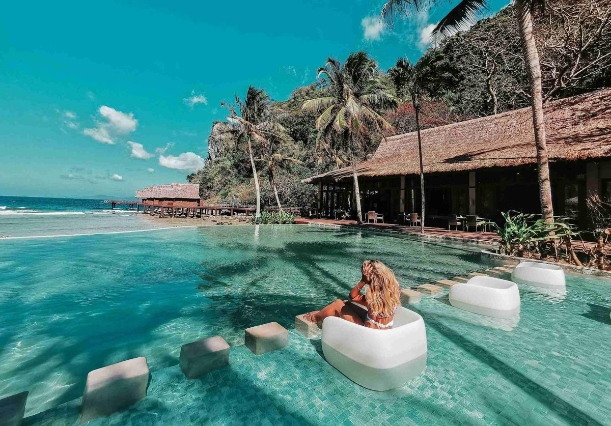 woman-in-swimming-pool-during-daytime