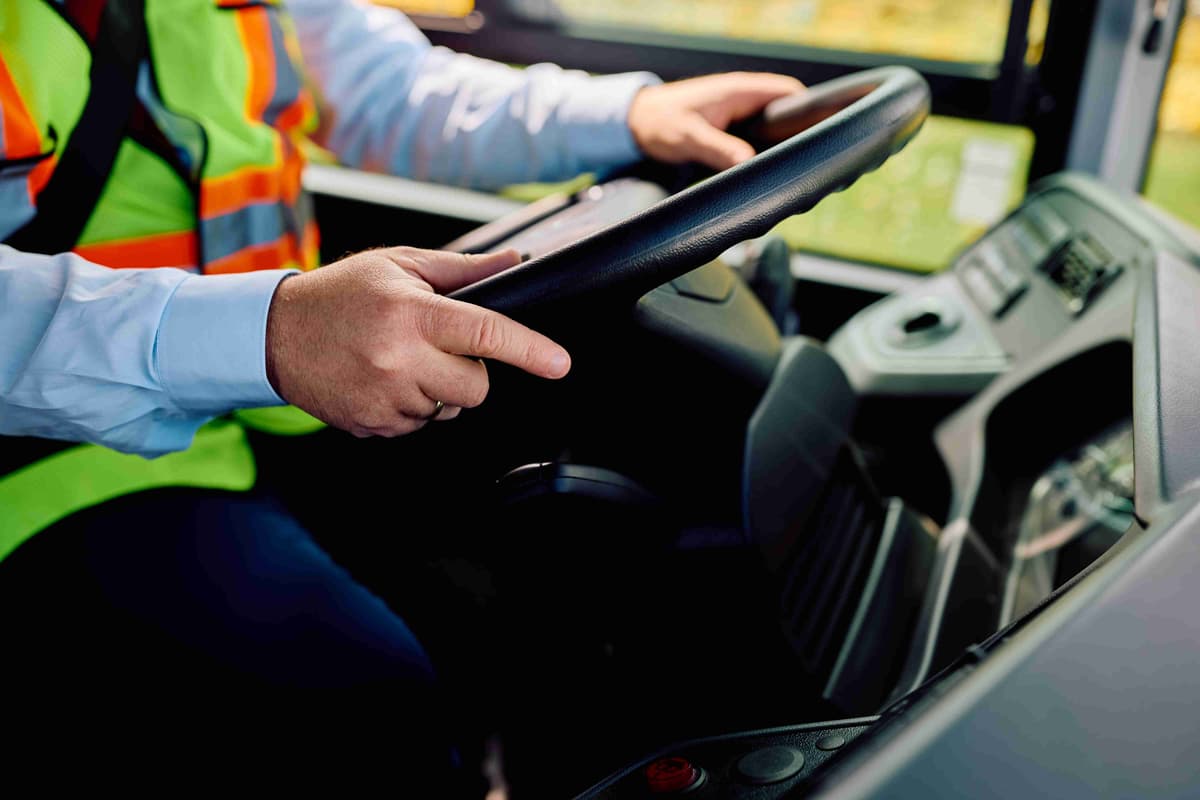 close-up-of-school-bus-driver-driving-a-bus