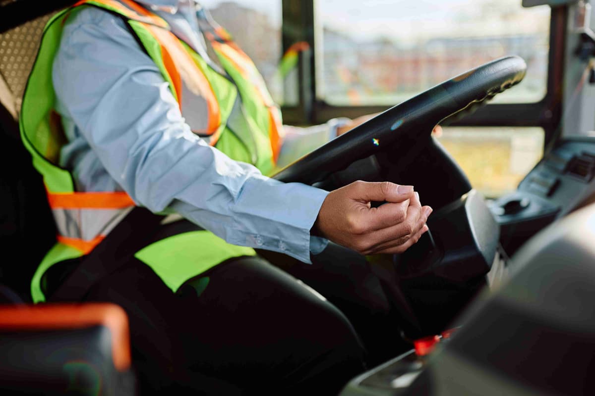 close-up-of-woman-driving-a-public-bus