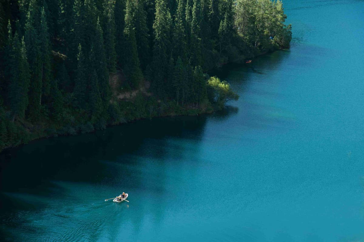 a-person-in-a-boat-on-a-body-of-water