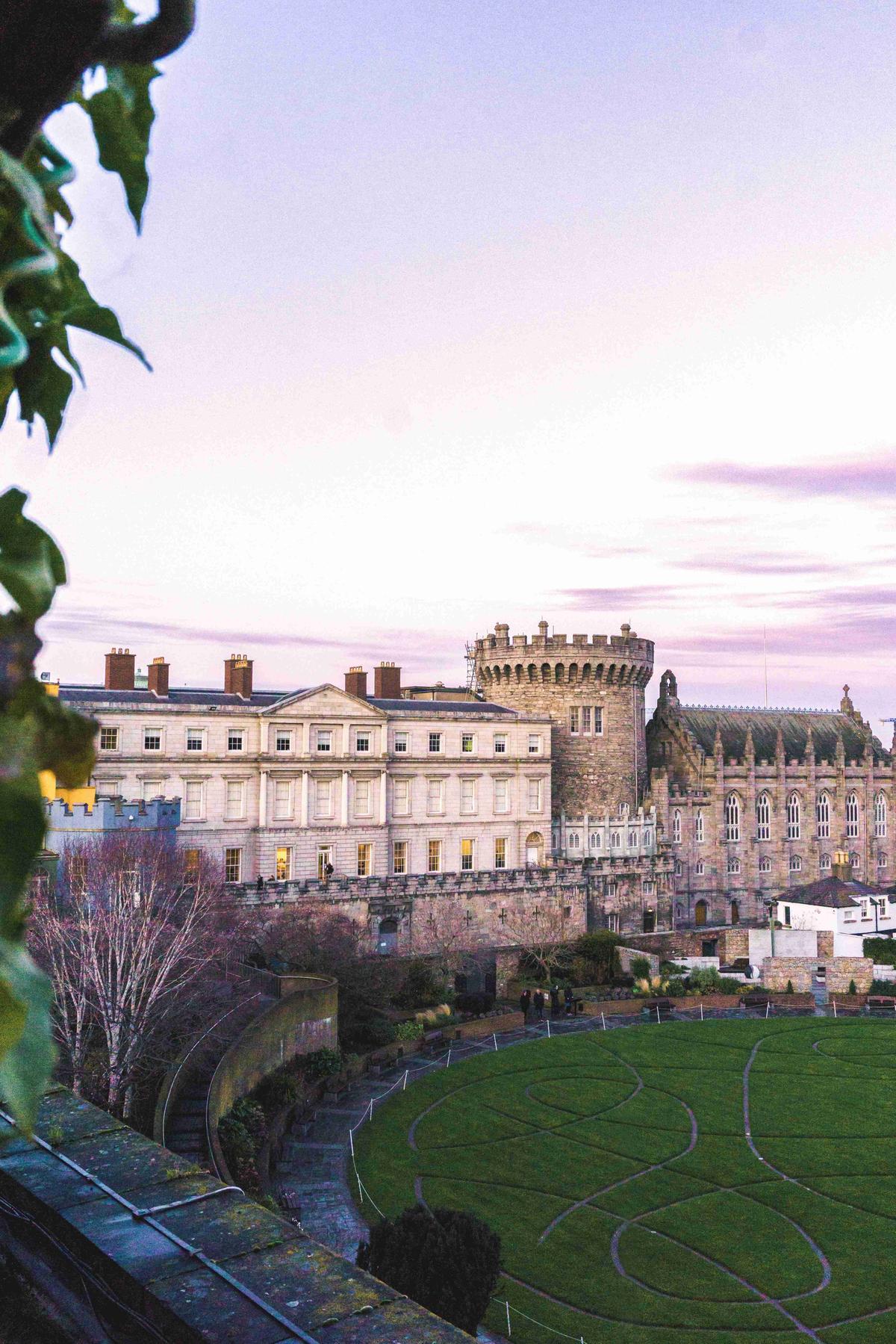 Historic Castle with Garden at Sunset