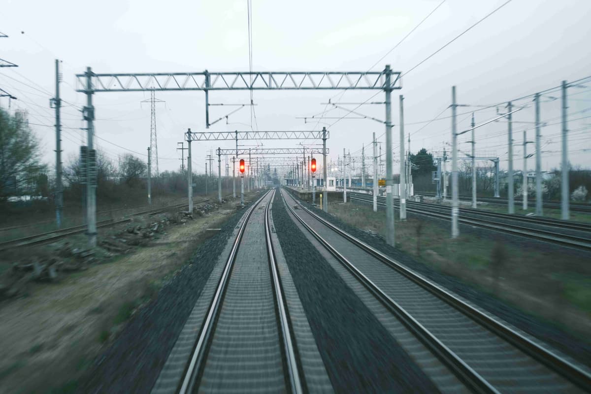 a-view-of-a-train-track-from-a-moving-train