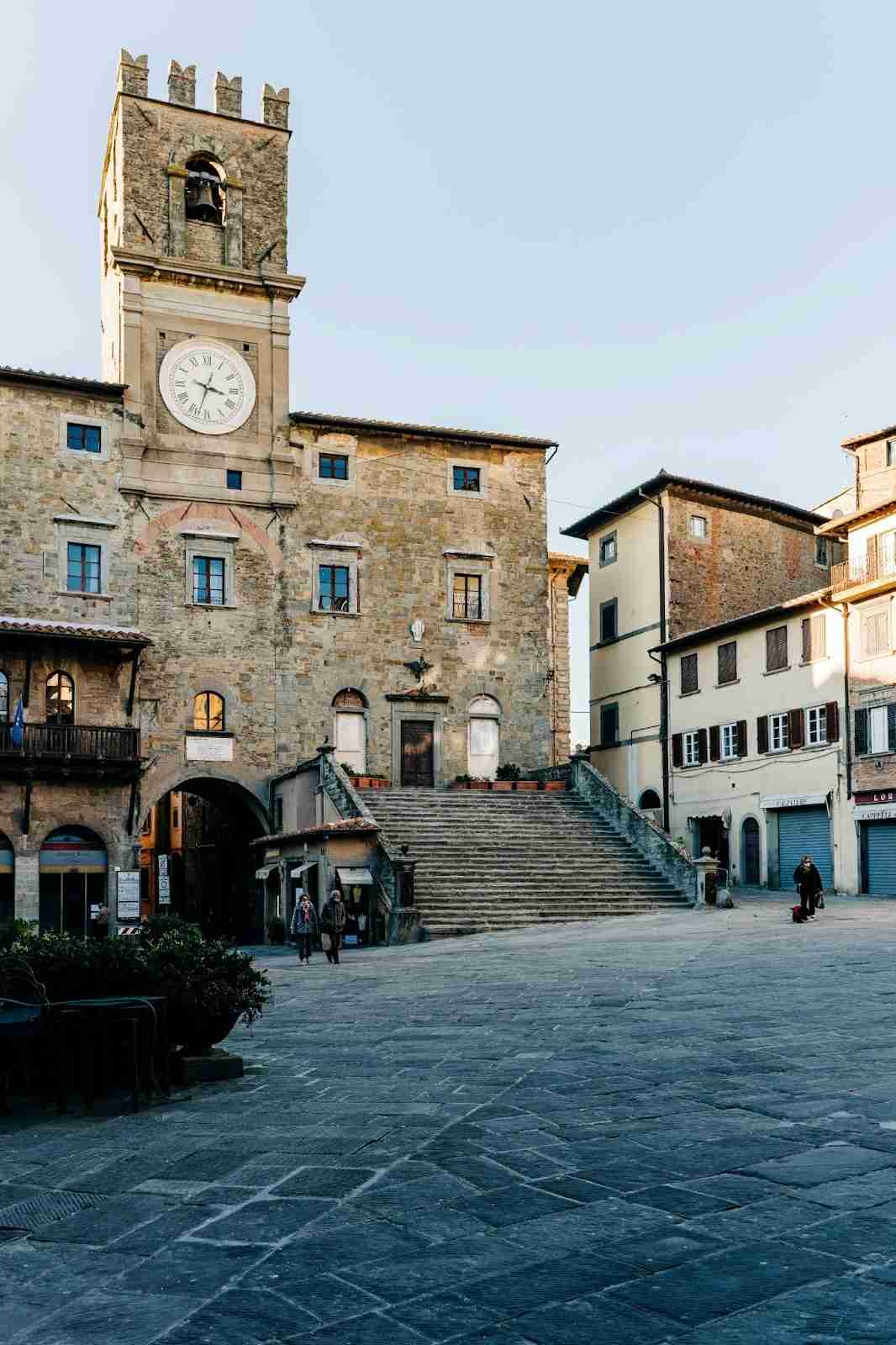 Clock Tower in a Quiet Italian Town Square