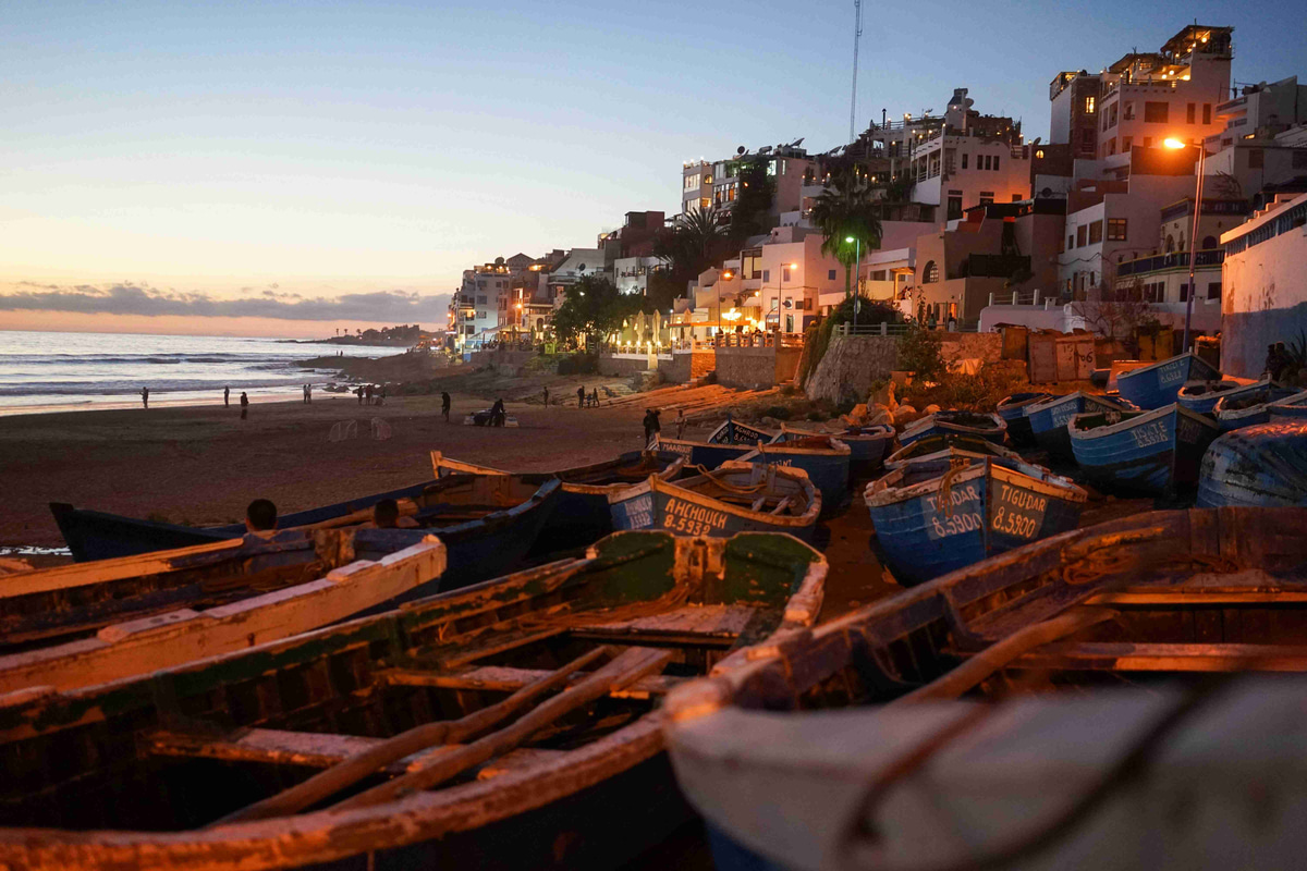 Beachside_Village_at_Sunset_with_Boats