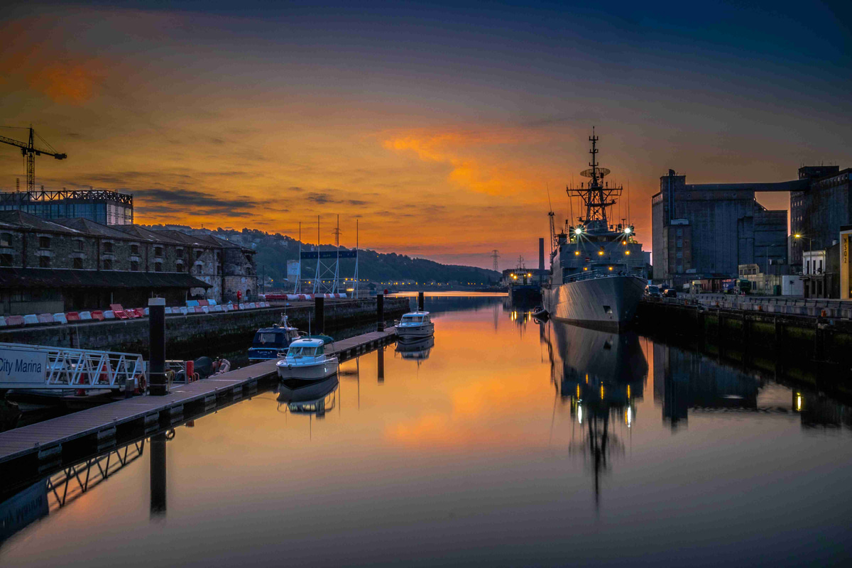 Harbor_Sunset_with_Naval_Ship