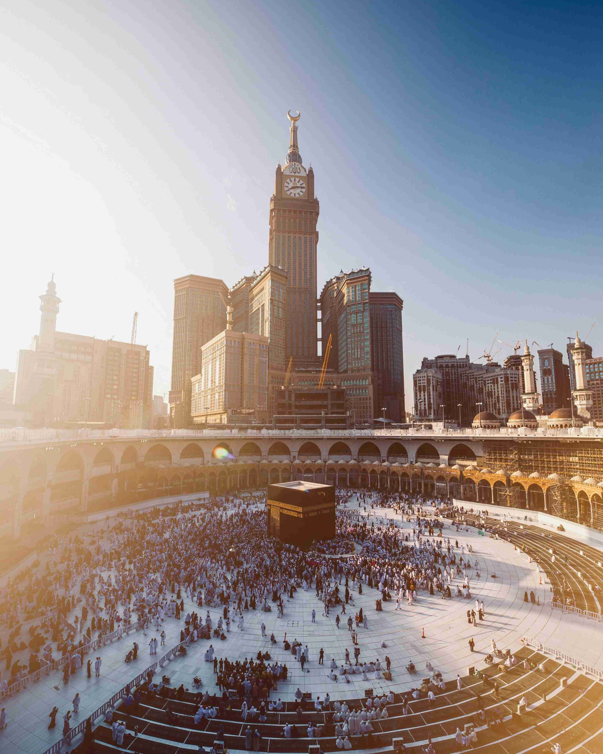 Kaaba_Mecca_with_Crowds_and_Abraj_Al_Bait_Tower_at_Sunset