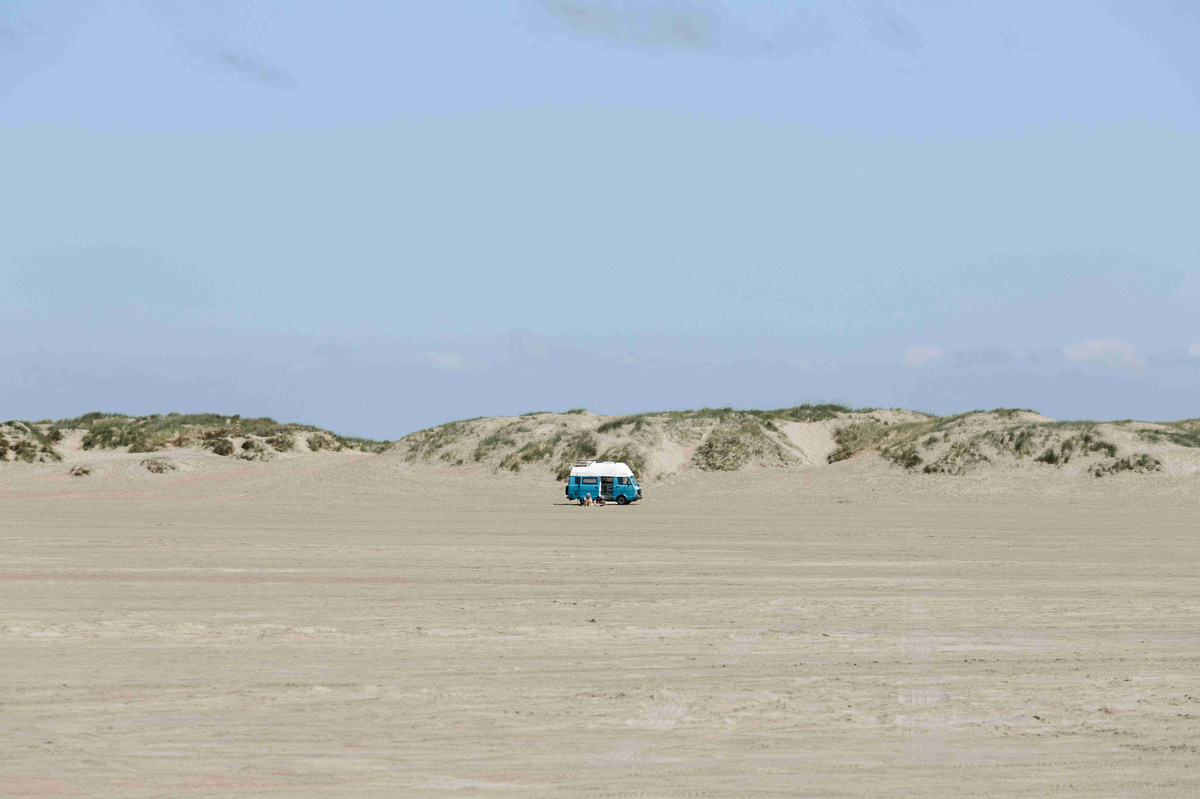 Lone_Van_on_Sandy_Beach_Dunes