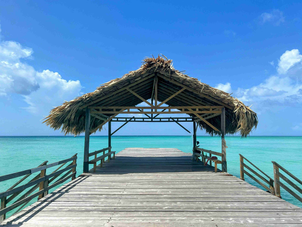 Tropical_Beach_Pier_with_Thatched_Roof_Gazebo