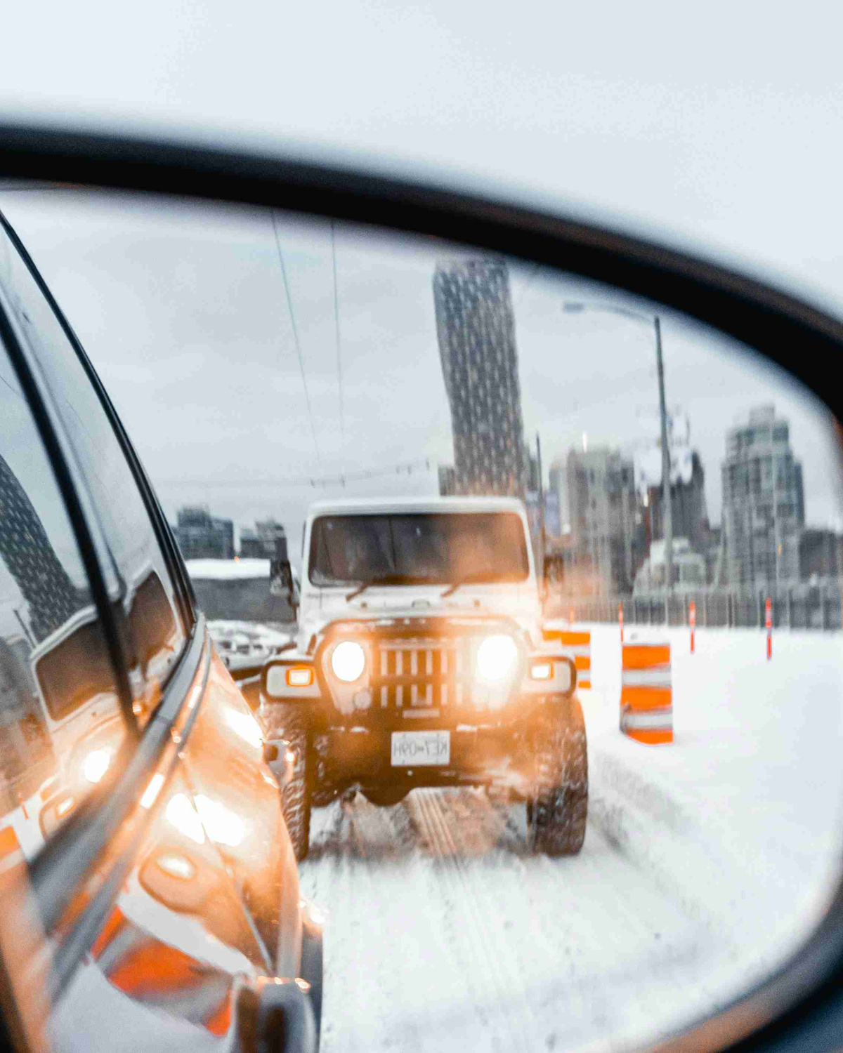 Winter_Road_Conditions_Through_Side_Mirror_Reflection
