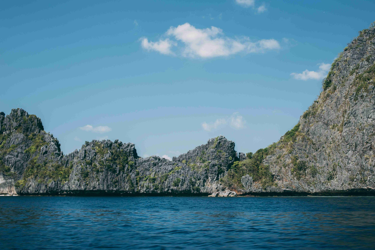 Rocky Island Landscape in Clear Blue Sea