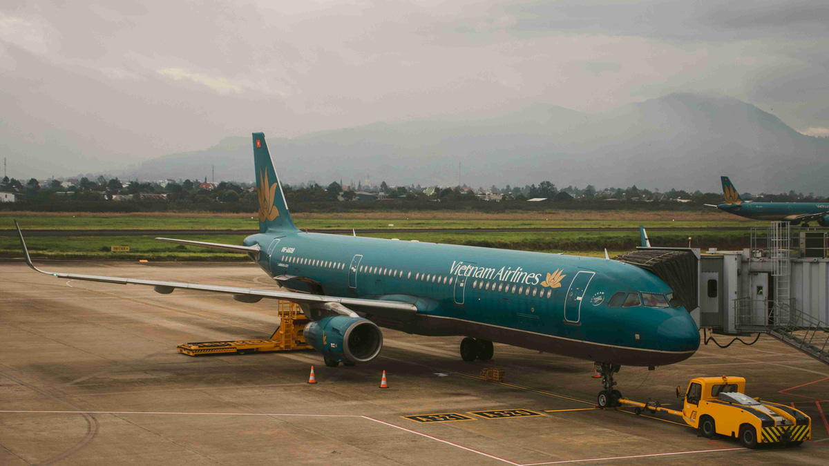 green-and-white-air-plane-on-airport